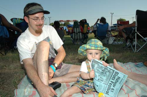 Young Finn Goodlett enjoying the program with his dad.